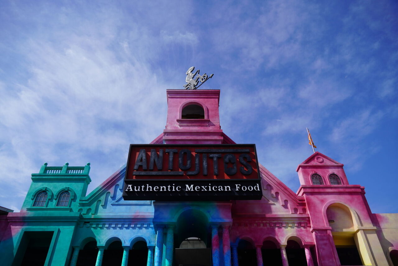 Antojitos Authentic Mexican Food exterior at Universal CityWalk, with colourful pink and teal facade