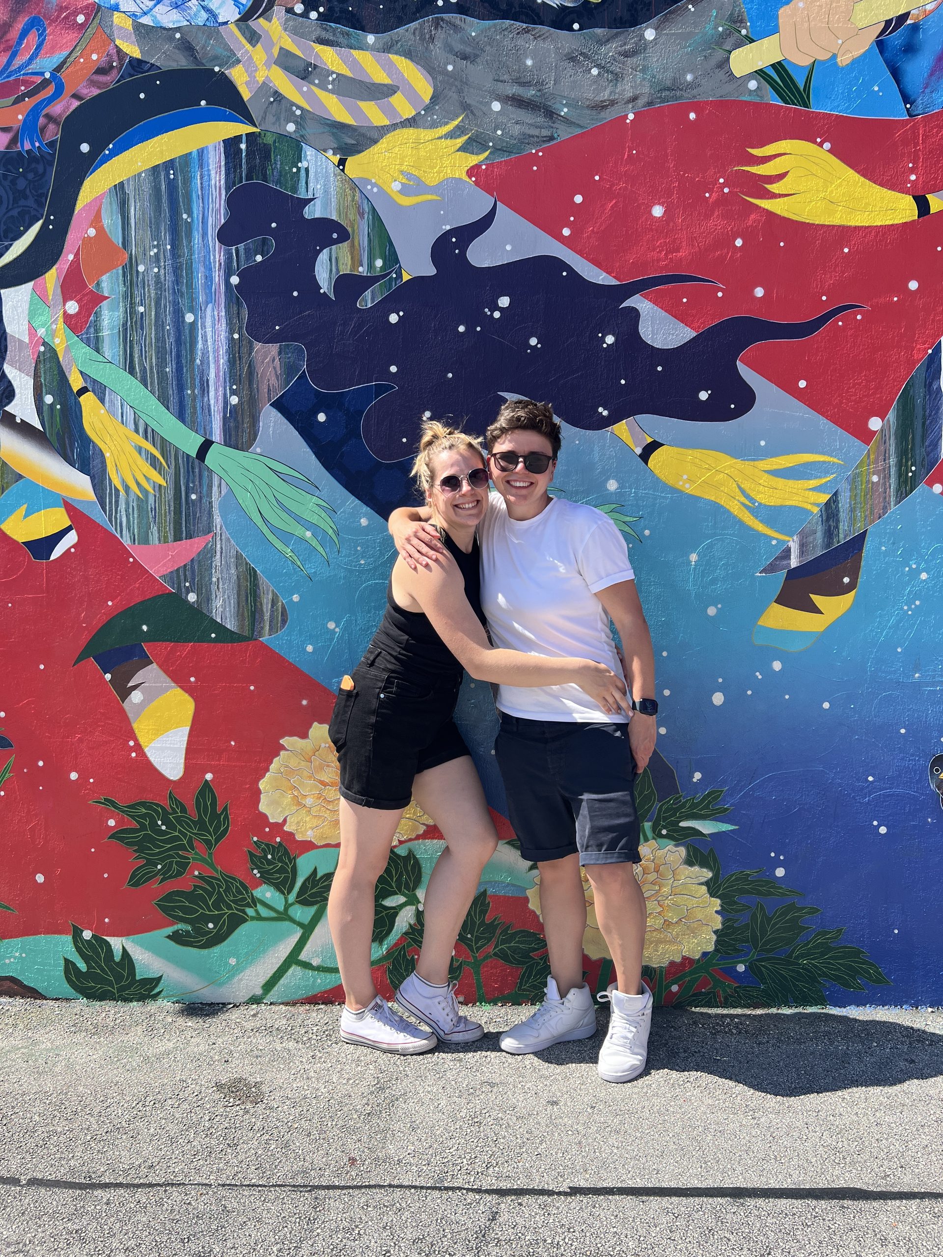 Cora and Helen in Front of Mural at Wynwood Walls in Miami Florida