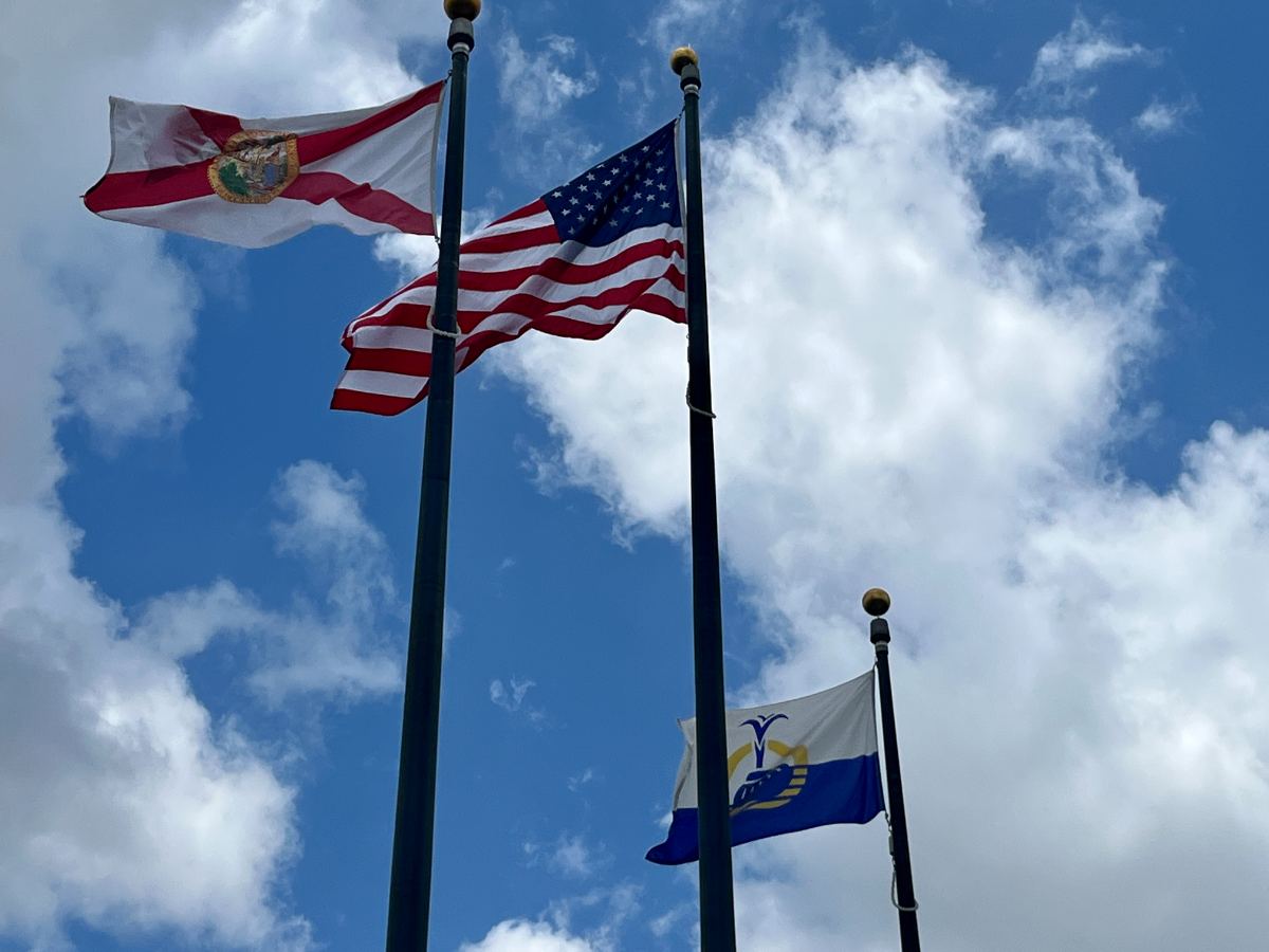 American, Florida, and Orlando flags flying at Lake Eola Park in downtown Orlando