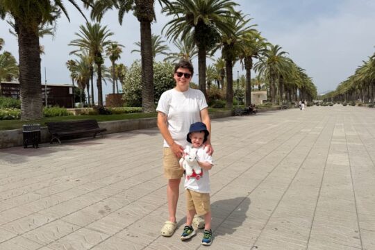 Oliver and Cora walking through the town centre of Salou, Spain